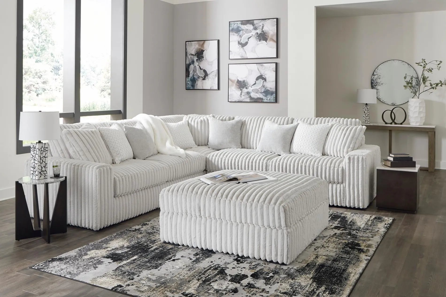 Pearl Cloud Sectional and chair in cream pinstripe channel