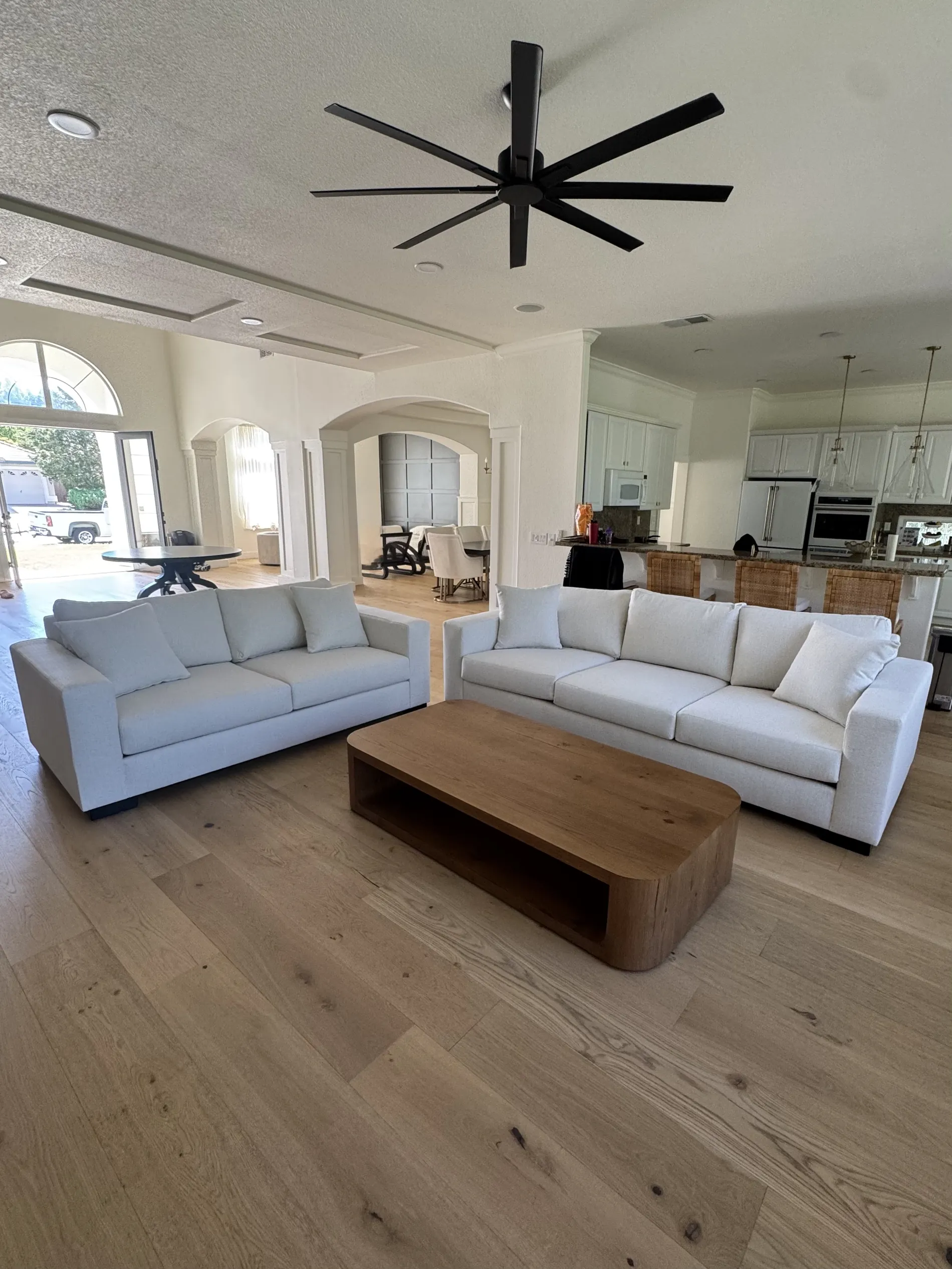 Custom cream sofa set in a bright living room